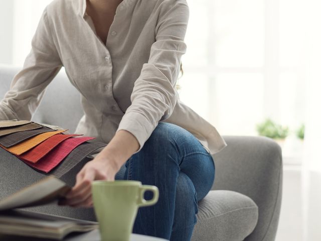 Woman looking at fabric samples